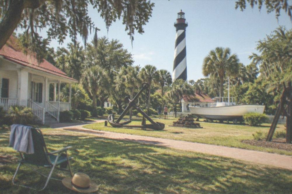 View of the lighthouse tower and maritime museum grounds from the lawn