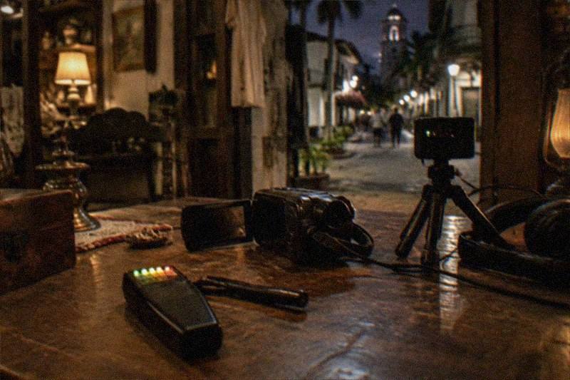 Ghost-hunting EMF gear inside a dim historic storefront in St. Augustine, Florida